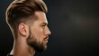 Stylish modern men's haircut and facial stubble in profile view. Copy space for text