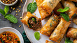 deep fried egg rolls with meat and vegetable filling