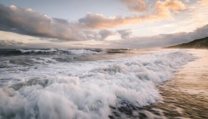 Wall Mural - foamy waves rolling up in ocean