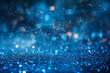 Dynamic scene of blue glittering sparks, blurred to create a magical, ethereal background