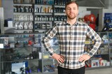 Fototapeta  - sales consultant in a car parts and accessories store