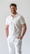 © Lin_Studio - A handsome German man, standing, wearing a white polo shirt, with hand in the pocket