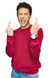 © Krakenimages.com - Young handsome man wearing casual clothes showing middle finger doing fuck you bad expression, provocation and rude attitude. screaming excited