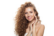 © artmim - Beauty portrait of woman face. Young model with healthy skin, long hair and makeup on white background