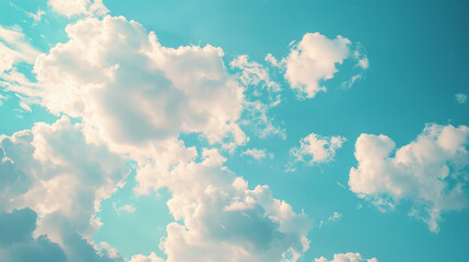 Wall Mural - The sky is blue with a few clouds scattered throughout