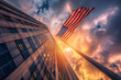 skyscrapper and american flag over sunset sky