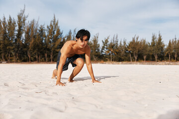 Wall Mural - Active Asian Athlete: Muscular Man Enjoying Sunset Run on Beach