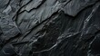 a black stone texture background for design, in the style of chiaroscuro contrast, chalk, smooth