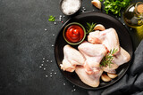 Fototapeta Mapy - Chicken wing, raw chicken meat with herbs.