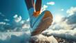 Female legs in sneakers running on the road through the clouds.