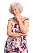 © Krakenimages.com - Senior grey-haired woman wearing casual clothes looking confident at the camera with smile with crossed arms and hand raised on chin. thinking positive.