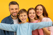 © Prostock-studio - Close-up of a family hug with kids