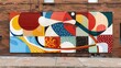 abstracted outdoor mural art on brick