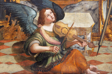 Wall Mural - VICENZA, ITALY - NOVEMBER 5, 2023: The angel from renaissance painting of Madonna with St. Sebastian and St. Roch in Chiesa di Santa Maria dei Servi by Benedetto Cincani - il Montagna (1480 - 1558).