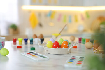 Canvas Print - Happy Easter. Painted eggs and watercolor on white marble table indoors