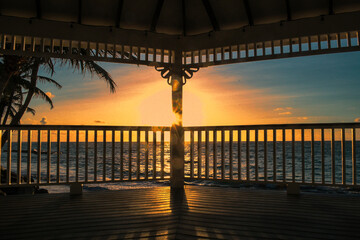 Sunrise behind a gazebo Coconut Bay, St. Lucia