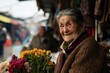 Portrait of an elderly woman selling flowers in the street market.