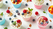 A variety of colorful yogurt cups, each filled with different flavors and textures. Some are topped with fresh berries or nuts, while others have swirls of colored cream on top