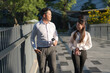 Business colleagues walking in urban setting