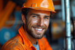 Smiling man in orange hard hat, industry hardhat confidence construction