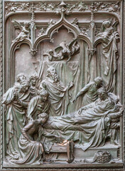 Wall Mural - MILAN, ITALY - SEPTEMBER 16, 2024: The detail from main bronze gate of the Cathedral -   Nativity of St. John the Baptist -  by Ludovico Pogliaghi (1906).