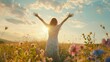© Fotograf - Woman standing with arms outstretched in a field. Suitable for inspirational or wellness concepts