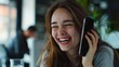 © Fotograf - A smiling woman talking on a cell phone. Suitable for communication and technology concepts
