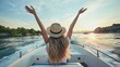 Woman with arms raised enjoying freedom on a boat at sunset. Travel and summer vacation concept