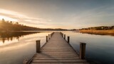 Fototapeta Pomosty - a wooden path to calm lake landscape nature photo minimal wallpaper