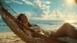© Fotograf - A woman enjoying a peaceful moment in a hammock on the beach. Perfect for travel and relaxation concepts