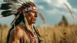 Portrait of an Apache warrior wearing a traditional headdress and feathers displaying indigenous culture and heritage in a field at sunset