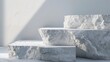 A pile of white marble blocks on a table, suitable for architectural or interior design projects