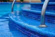 Blue Swimming Pool With Metal Hand Rail