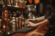 © ChaoticMind - A skilled bartender is preparing a cocktail, focusing on pouring ingredients into a shaker as part of the sophisticated drink crafting process
