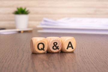 Poster - Word Q and A written on wooden cubes. question and answer concept