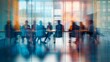 © Ashi - Group of professionals engaged in brainstorming session inside glass-partitioned boardroom - business meeting concept with blurred effect