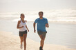 © peopleimages.com - Cardio, beach and running with couple, fitness and summer with wellness and practice with morning routine. Seaside, energy or man with woman or runner with training and ocean with exercise or workout