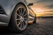 Dramatic sunset close up of tire adds depth to automotive scene