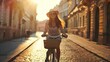 Young traveler riding a bike in street with historic buildings in the city of Prague, Czech Republic in Europe.