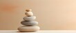 Tranquil stack of pebbles symbolizing balance and peace in spa setting. Harmony in Stones Spa Wellness