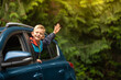 © kieferpix - Portrait of happy little boy in car. Family road trip, summer holiday travel concept.