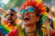 Joyful woman celebrating at a vibrant outdoor festival with colorful attire