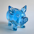 光沢のある青いガラス製の豚の貯金箱