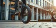 Self-balancing unicycle in action, close-up on the wheel and tech, dynamic urban setting, fun and innovative