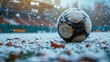 soccer ball in the snow in an empty stadium  sports winter break  season pause or end  copy space  generative ai