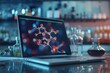 A digital image showing the molecular structure of a breakthrough drug is displayed on a laptop in the lab.