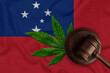 Judge gavel and cannabis leaf on the flag of Samoa. Concept of legalization of marijuana
