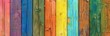 Colorful wooden planks background in the style of a rainbow color for lgbt pride celebration. Wooden wall texture with colorful wood slats. Rainbow flag banner design.