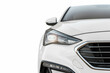 Modern car front detail on white background
