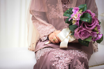 Wall Mural - Wedding bouquet of flowers. Bride holding bouquet of roses.